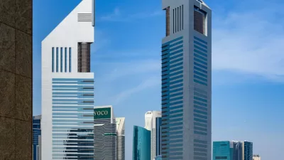 iconic emirates towers in dubai skyline