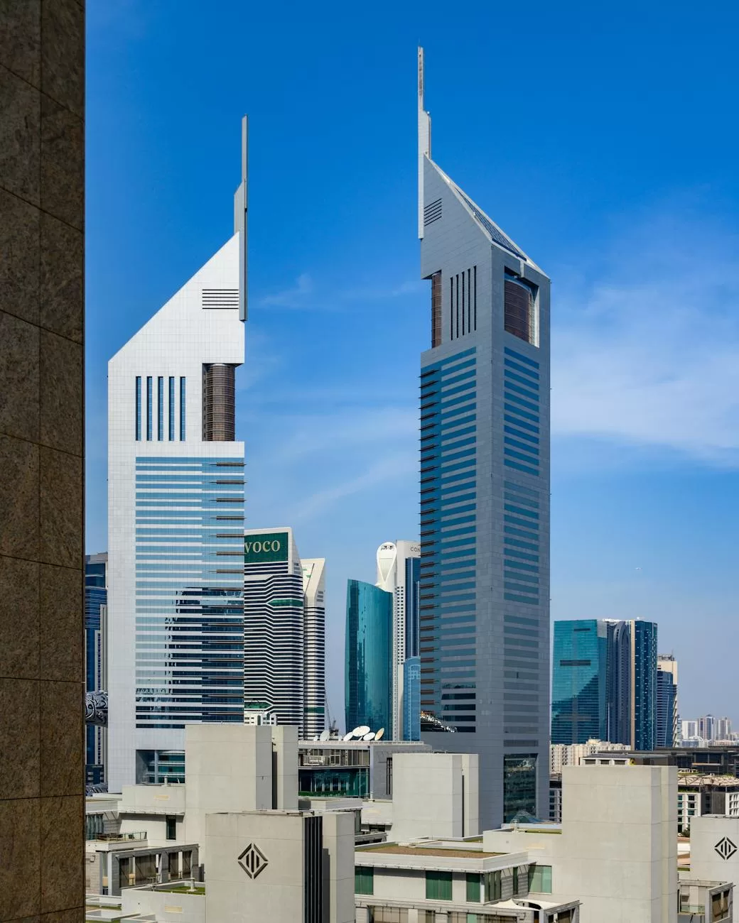 iconic emirates towers in dubai skyline
