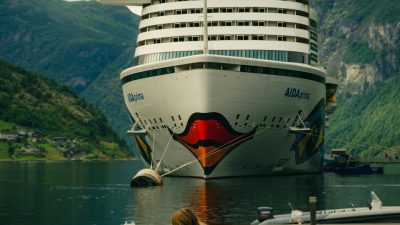 cruise ship in majestic norwegian fjord