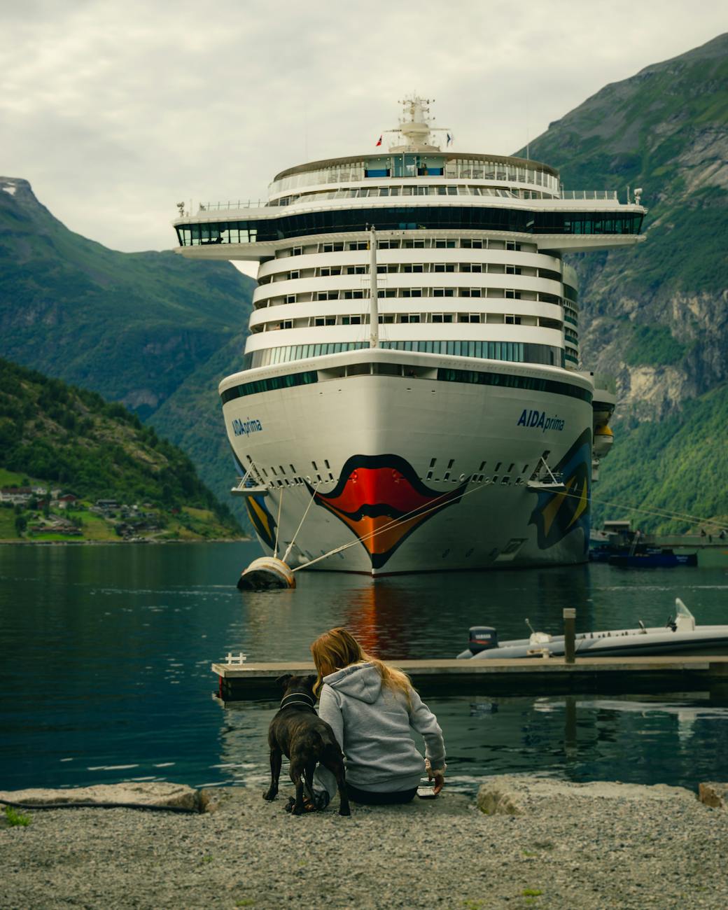 cruise ship in majestic norwegian fjord