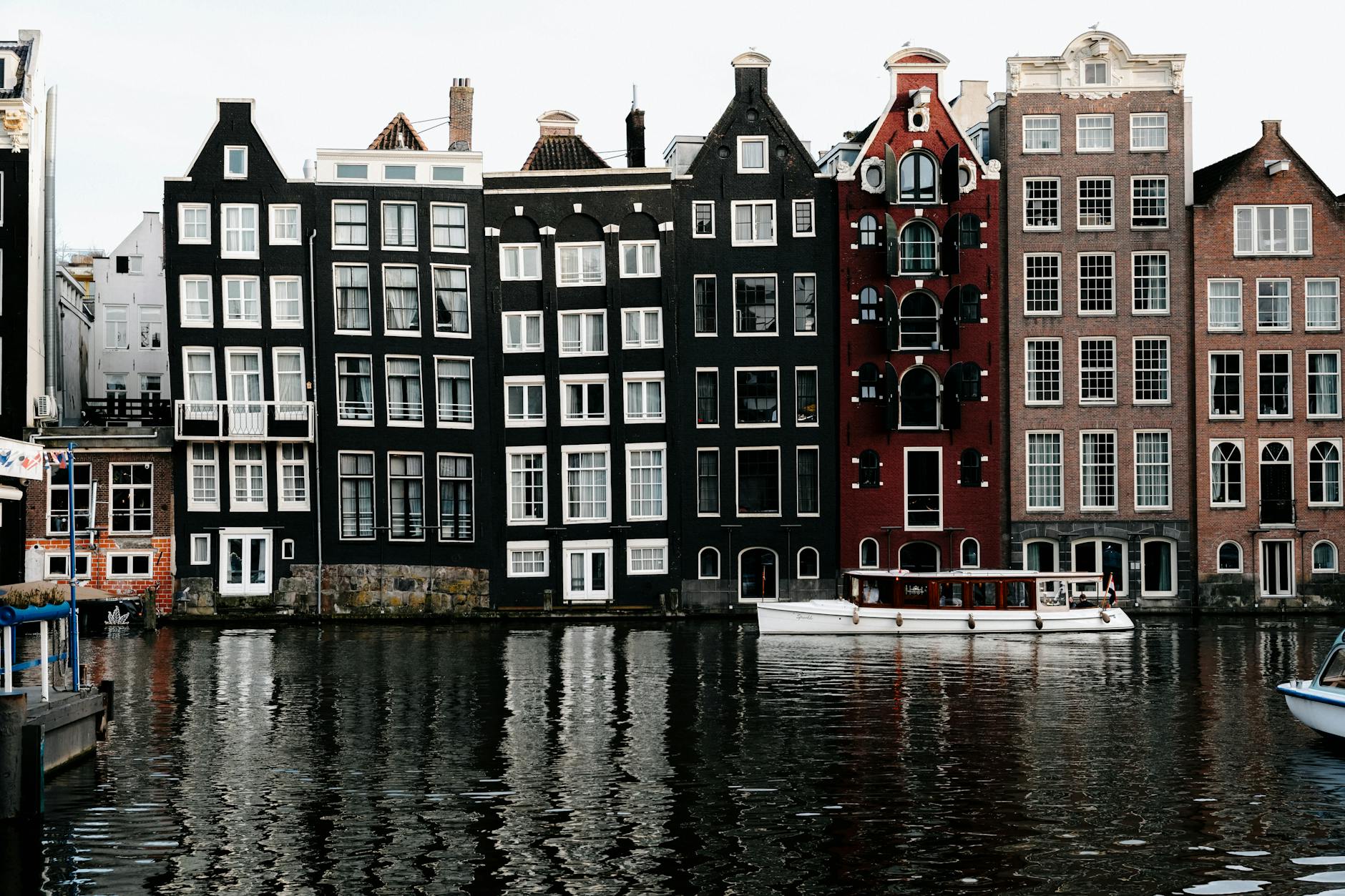 charming amsterdam canal houses reflection