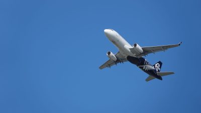airplane with clear sky in new zealand landscape