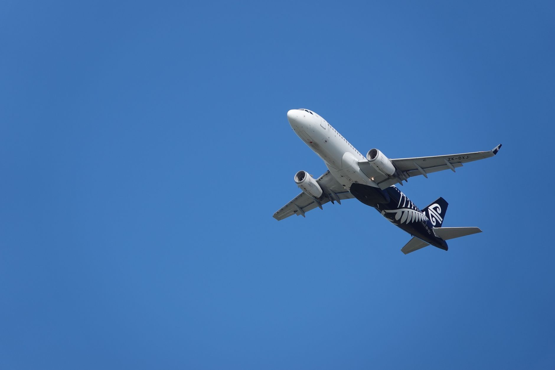 airplane with clear sky in new zealand landscape