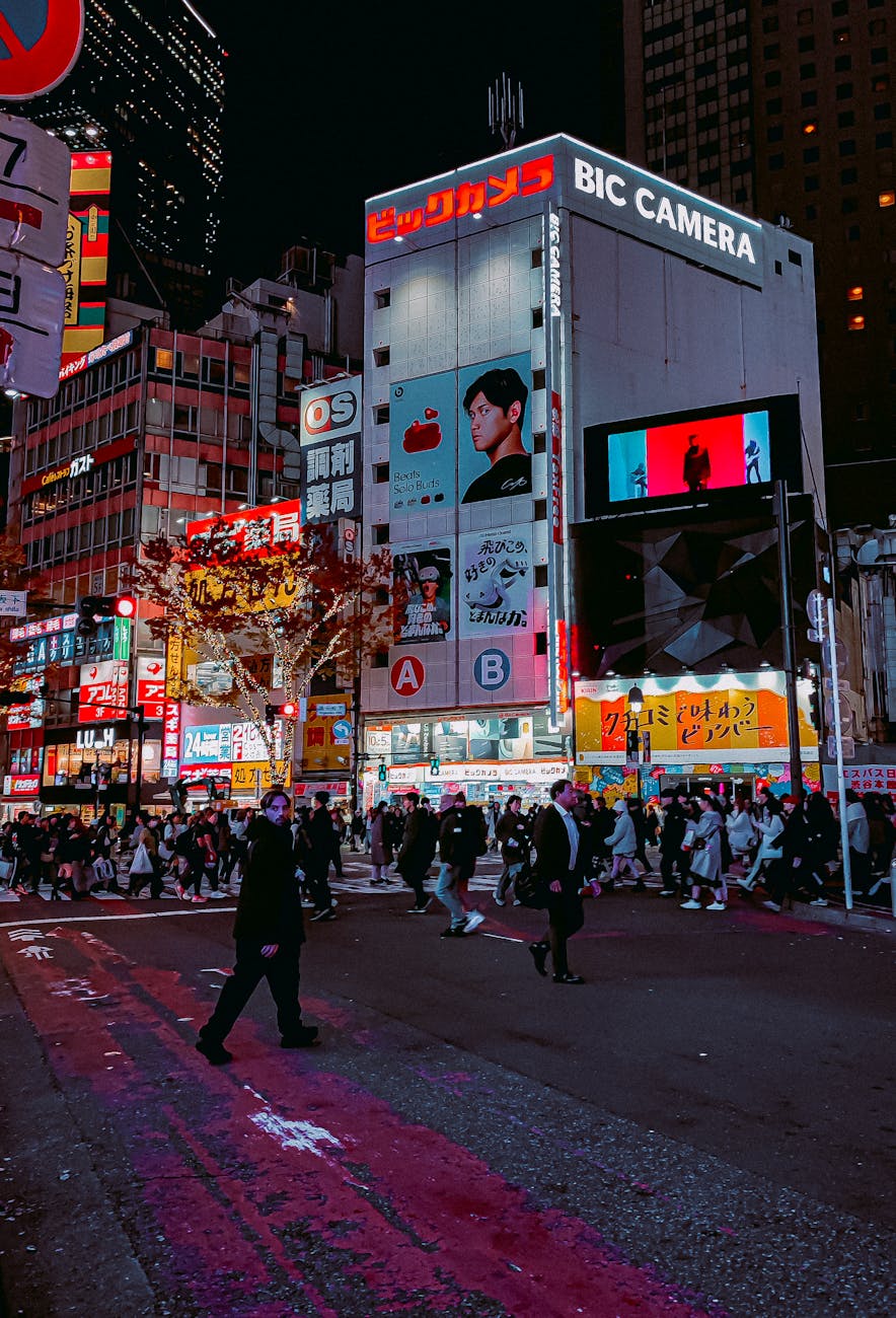 vibrant night scene at shibuya crossing tokyo