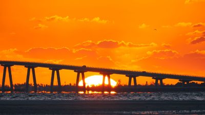 sunset view of causeway bridge in florida