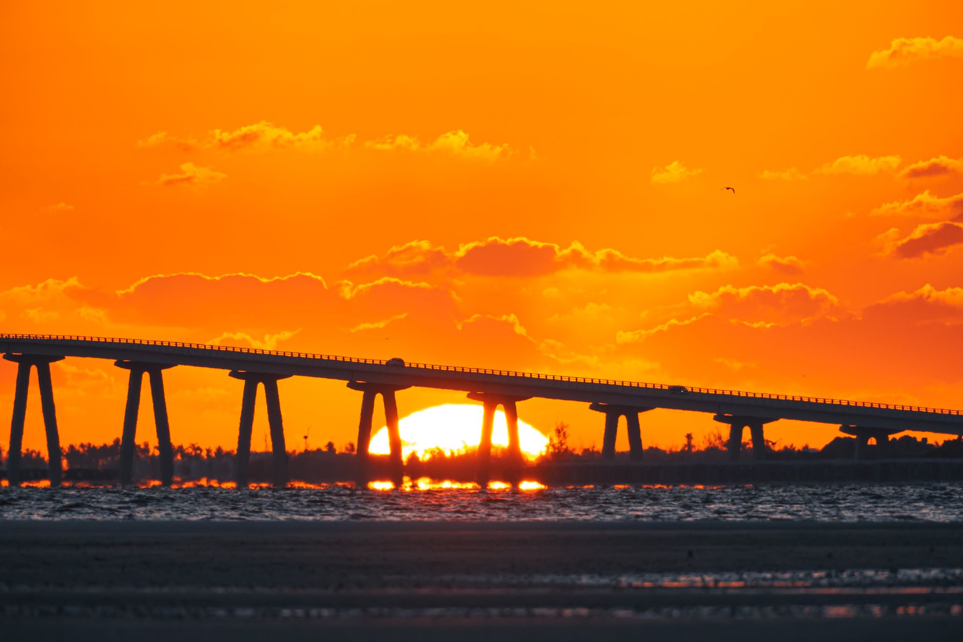 sunset view of causeway bridge in florida