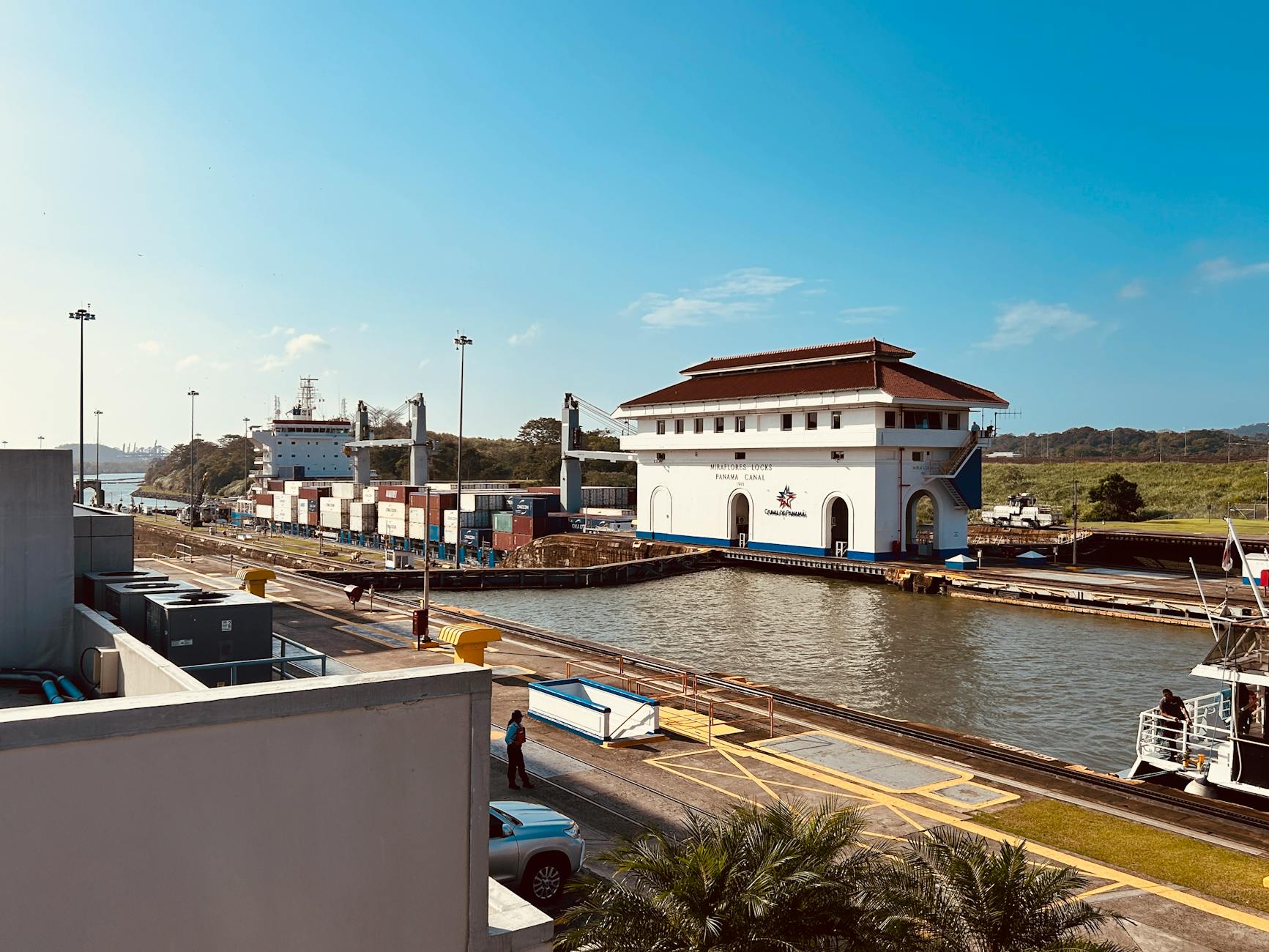 panama canal miraflores locks under clear blue sky