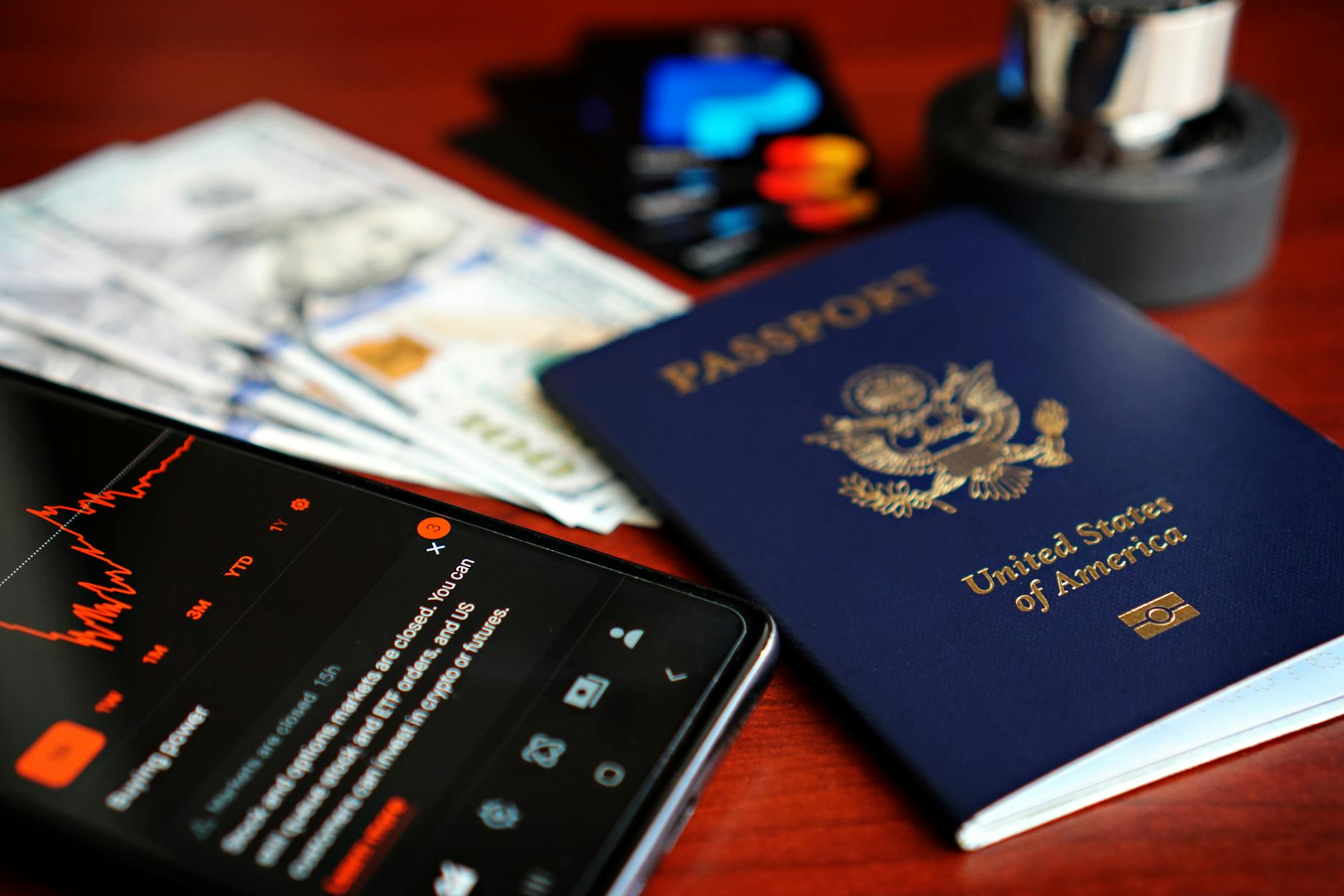 travel essentials with us passport and currency