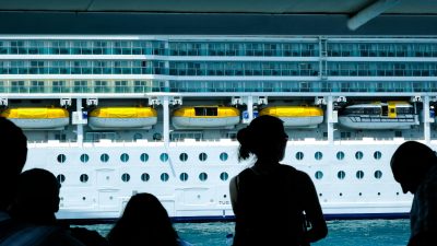 silhouette of people watching cruise ship in turkiye