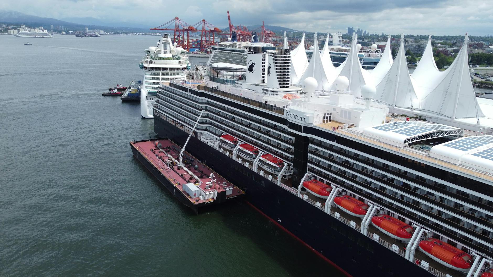 cruise ship docked at vancouver harbor