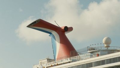 luxurious cruise ship against blue sky