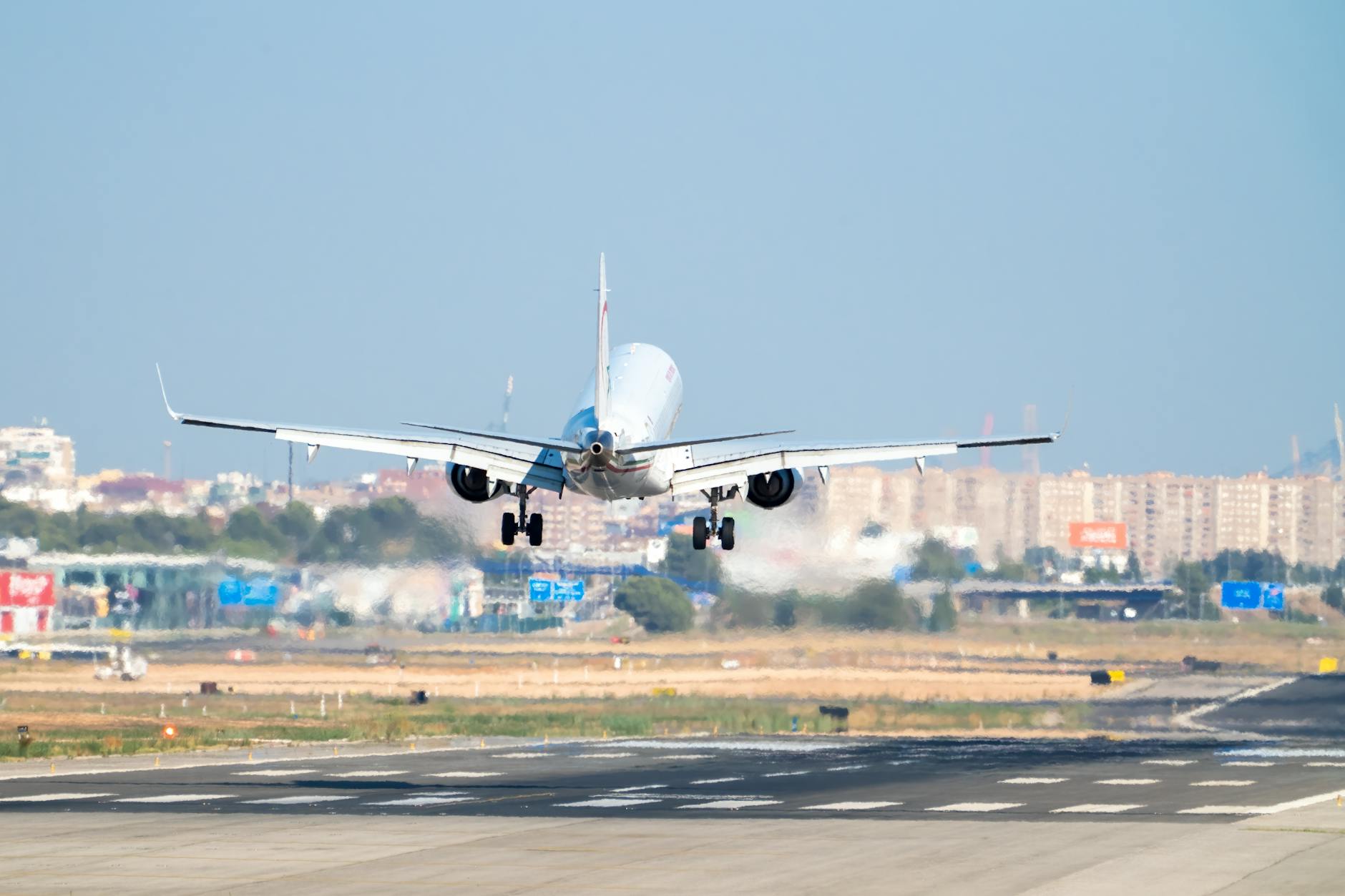 commercial airplane landing at manises airport