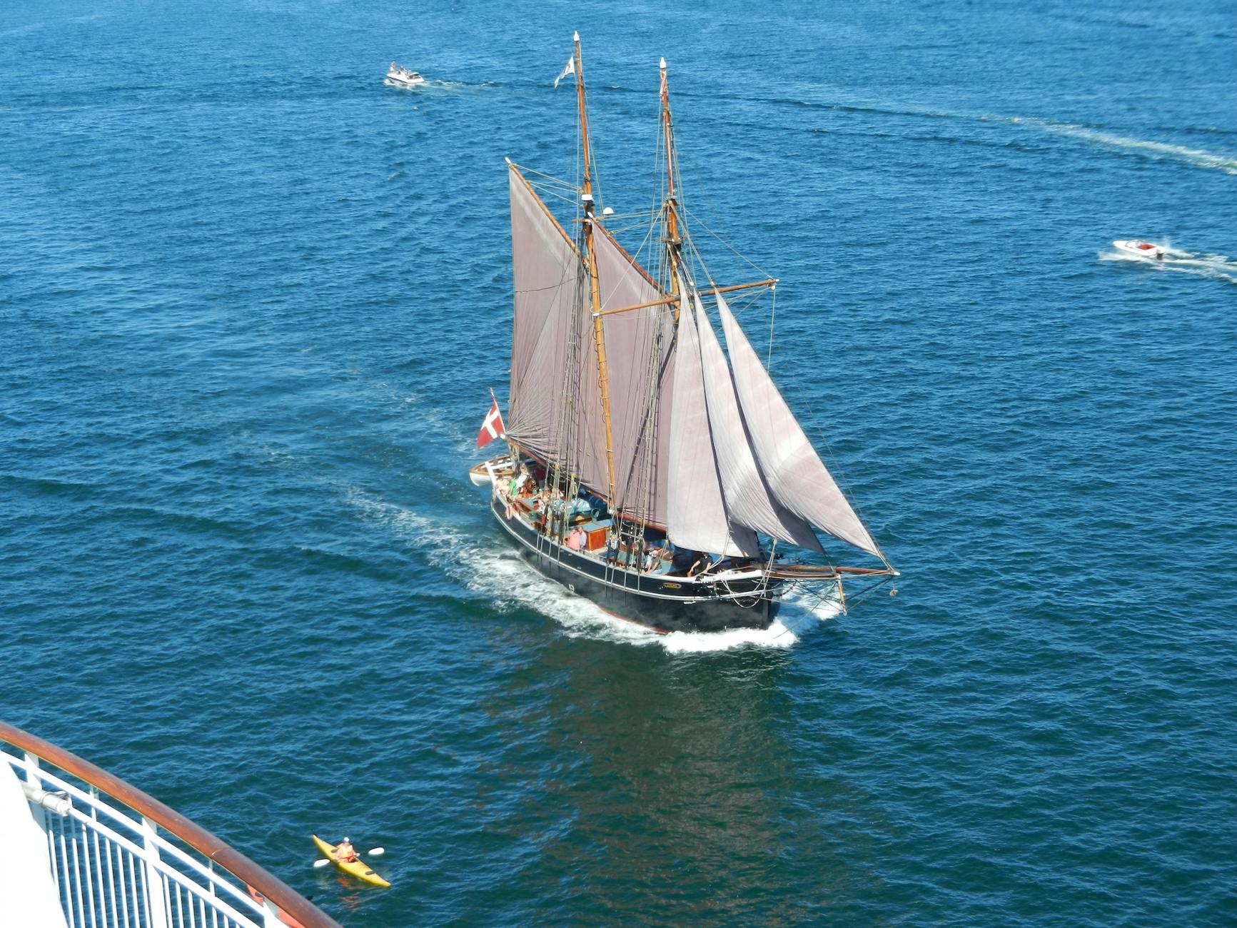 sailing ship on open blue sea adventure