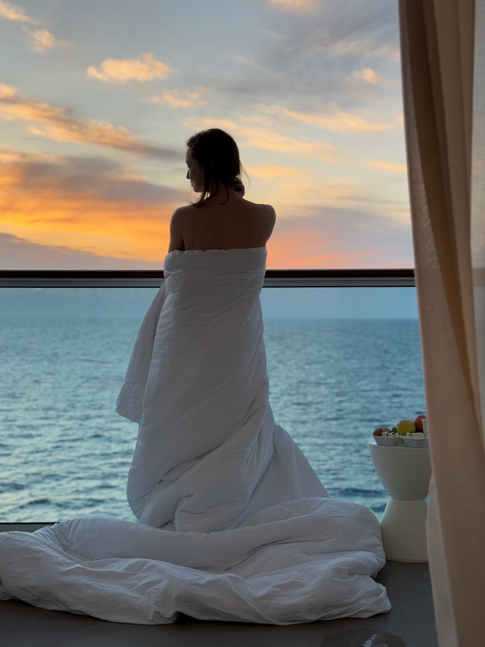 serene ocean view from balcony at sunset