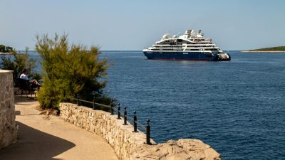 elegant cruise ship near primosten coastline
