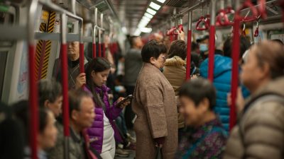 busy commuters in hong kong island subway