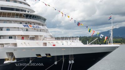 cruise ship koningsdam docked in scenic port