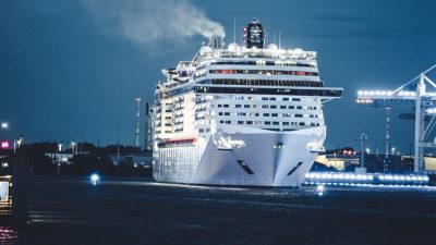 majestic cruise ship in night harbor scene