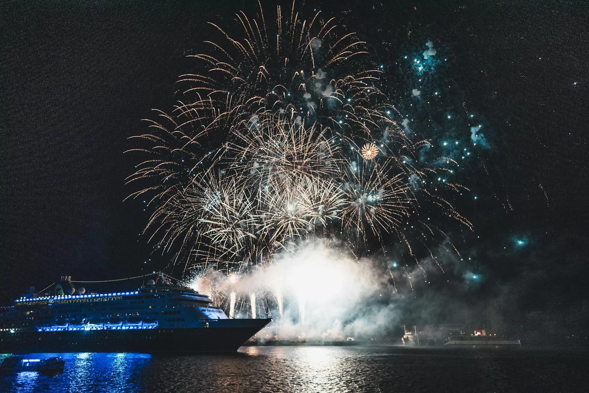 spectacular fireworks over cruise ship at night