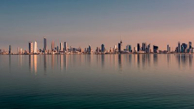 city and sea during day