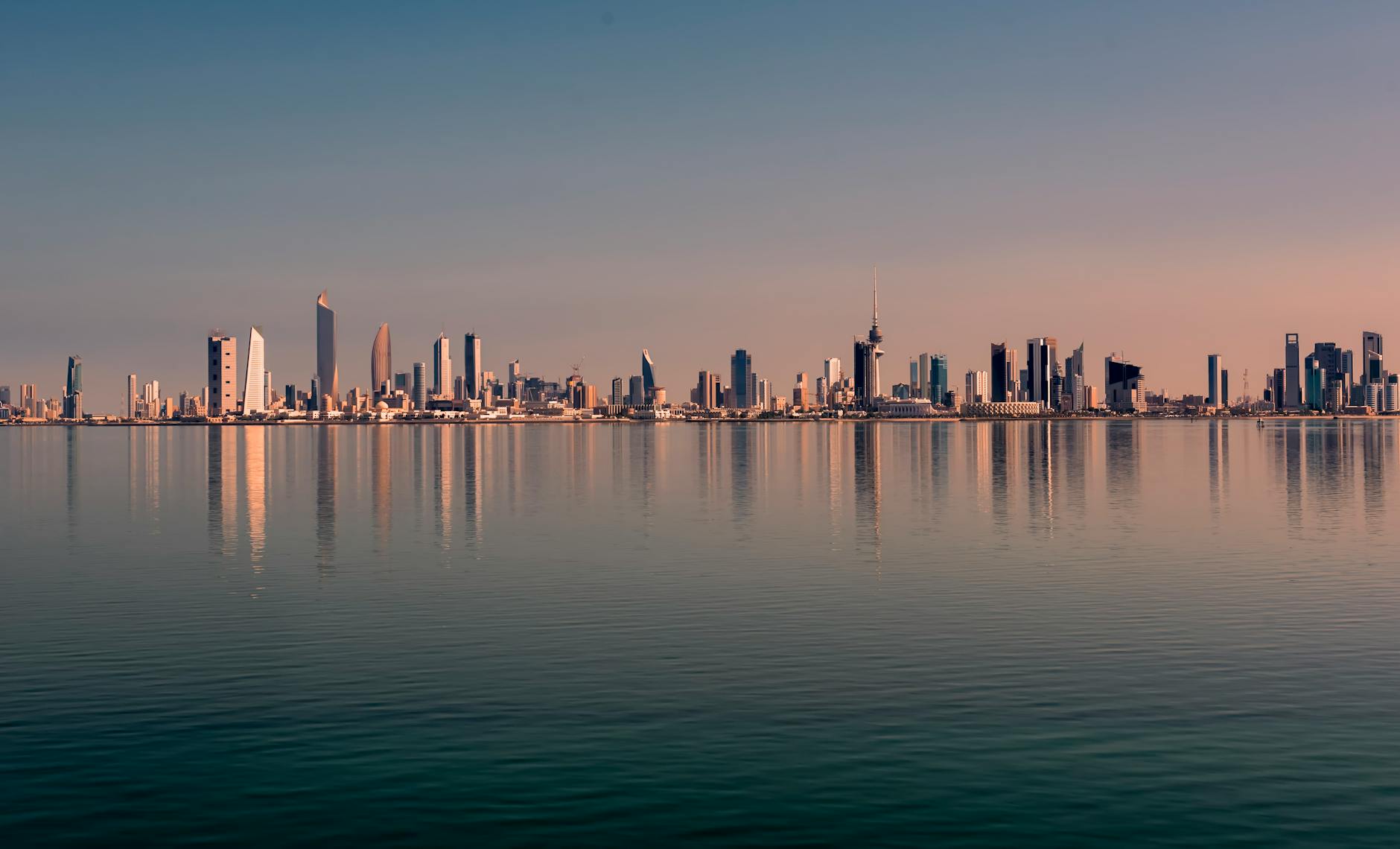 city and sea during day