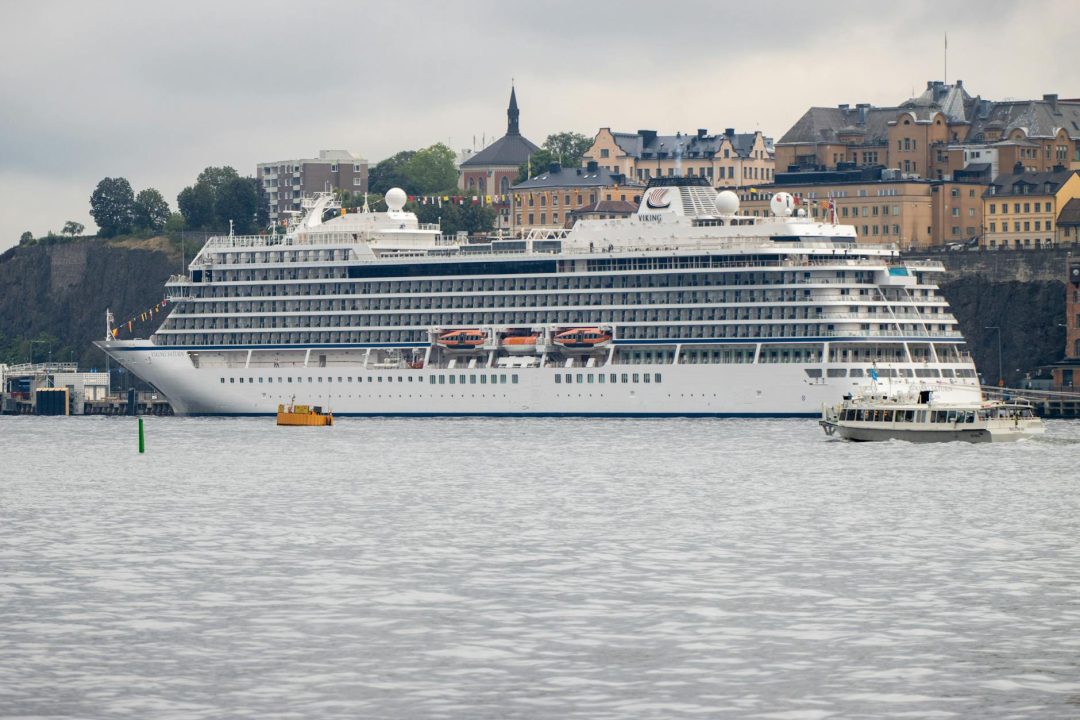 viking cruise ship docked in stockholm harbor