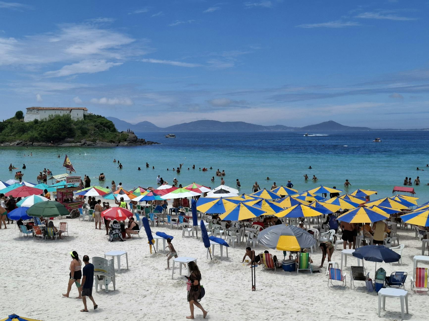 vibrant beach scene with colorful umbrellas