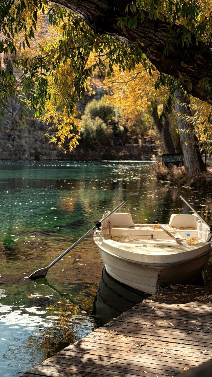 tranquil boat on serene autumn lake