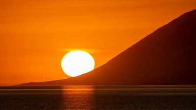 gorgeous sunset over icelandic ocean horizon