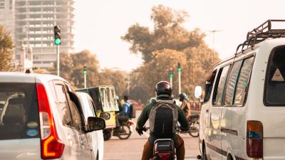 busy lahore intersection with traffic and motorists