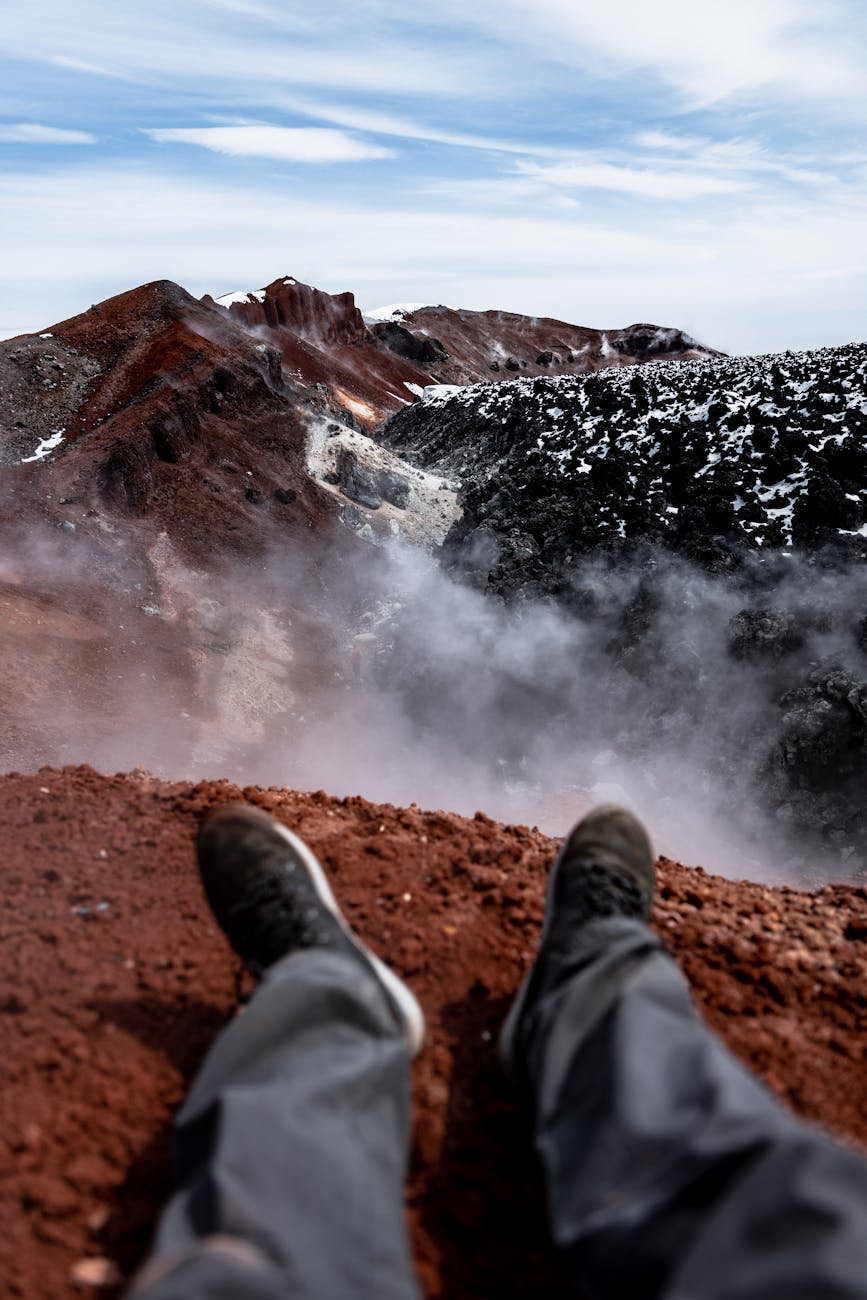 hiker s perspective over volcanic crater