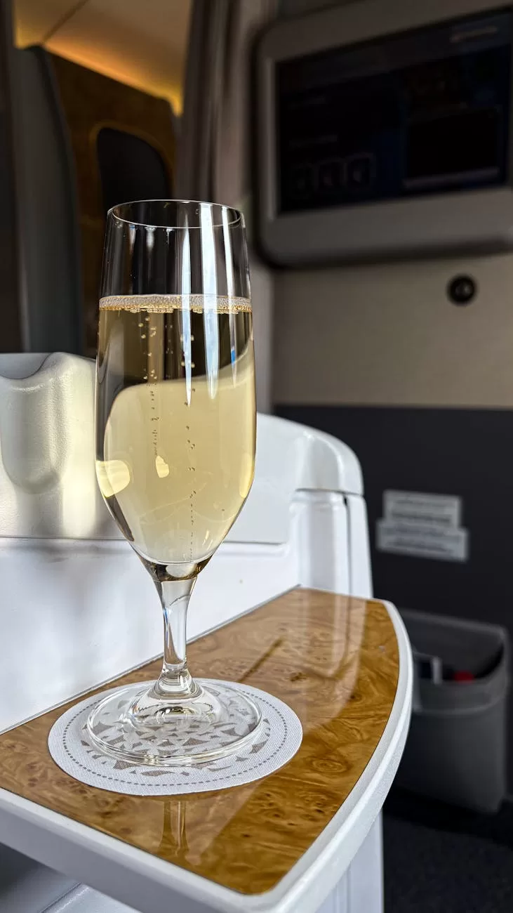 first class in flight champagne experience
