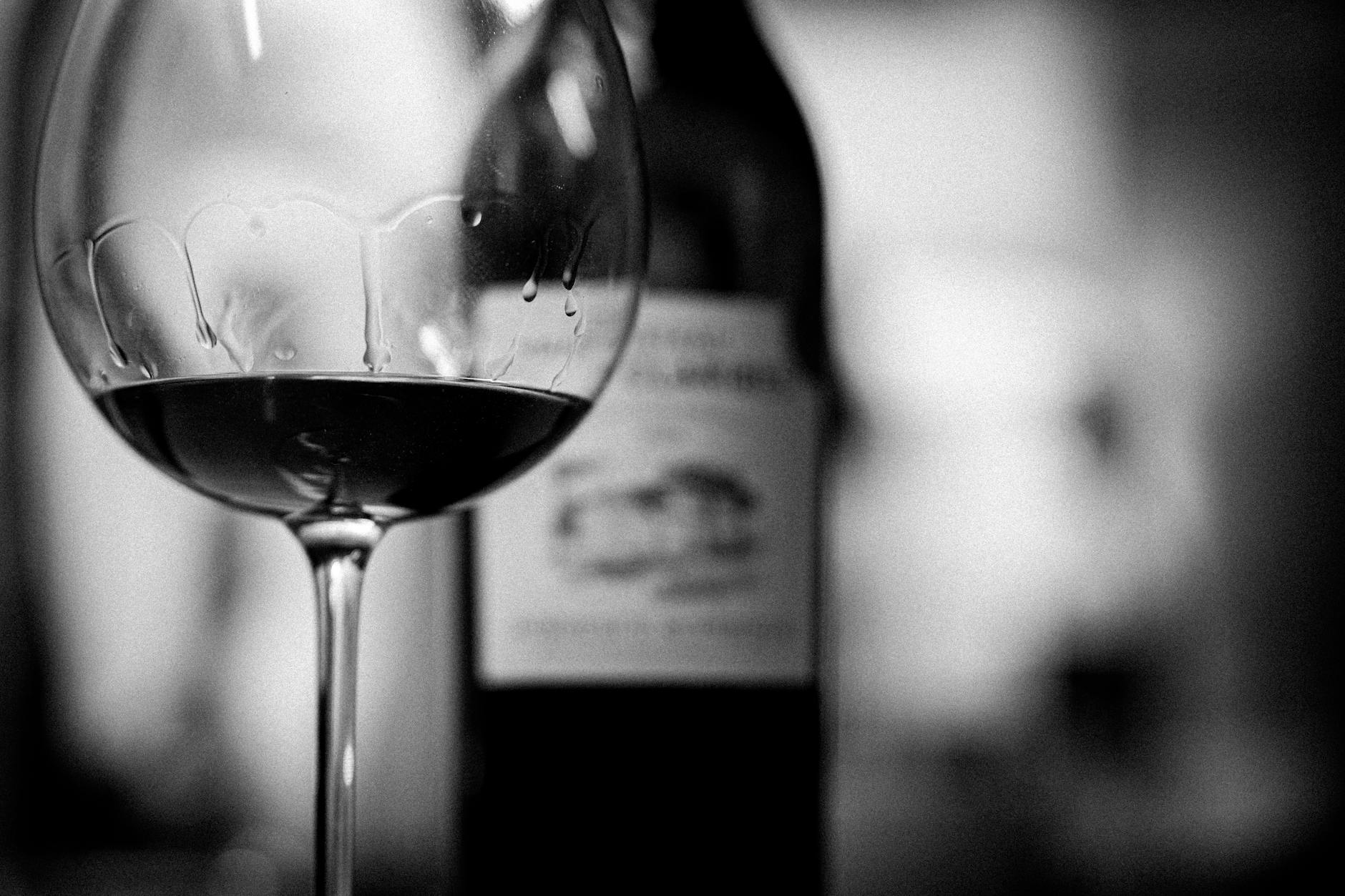 elegant black and white wine glass and bottle