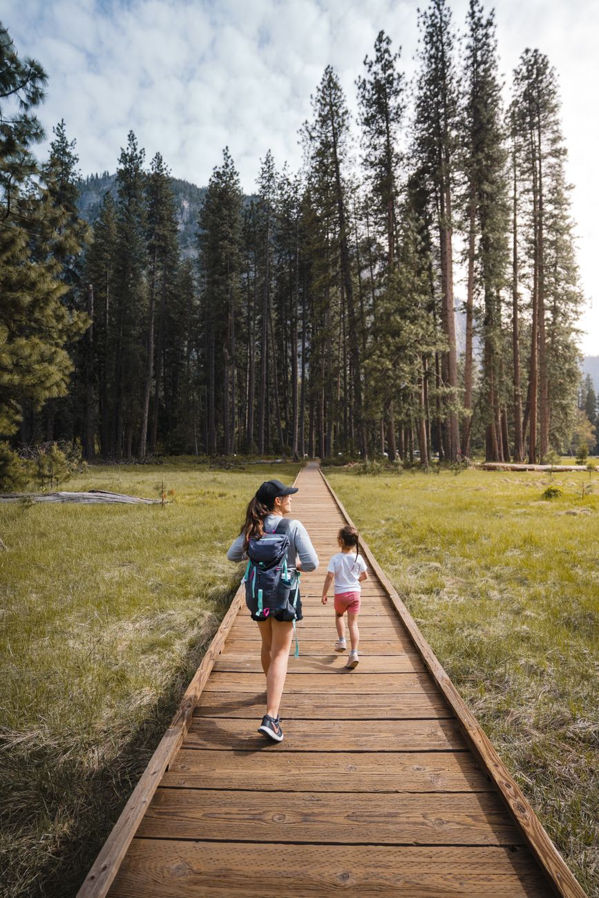 mother and child hiking in yosemite national park