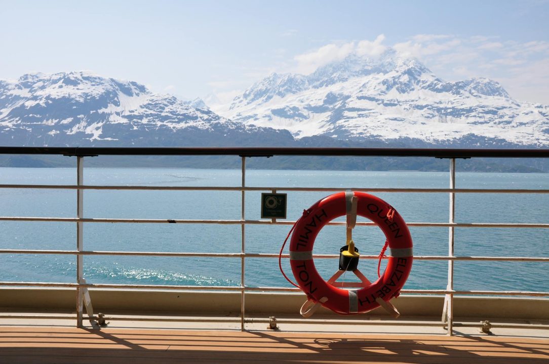 snowy mountains view from ship in alaska