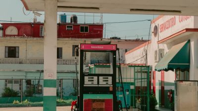 vintage gas station in urban cuban setting