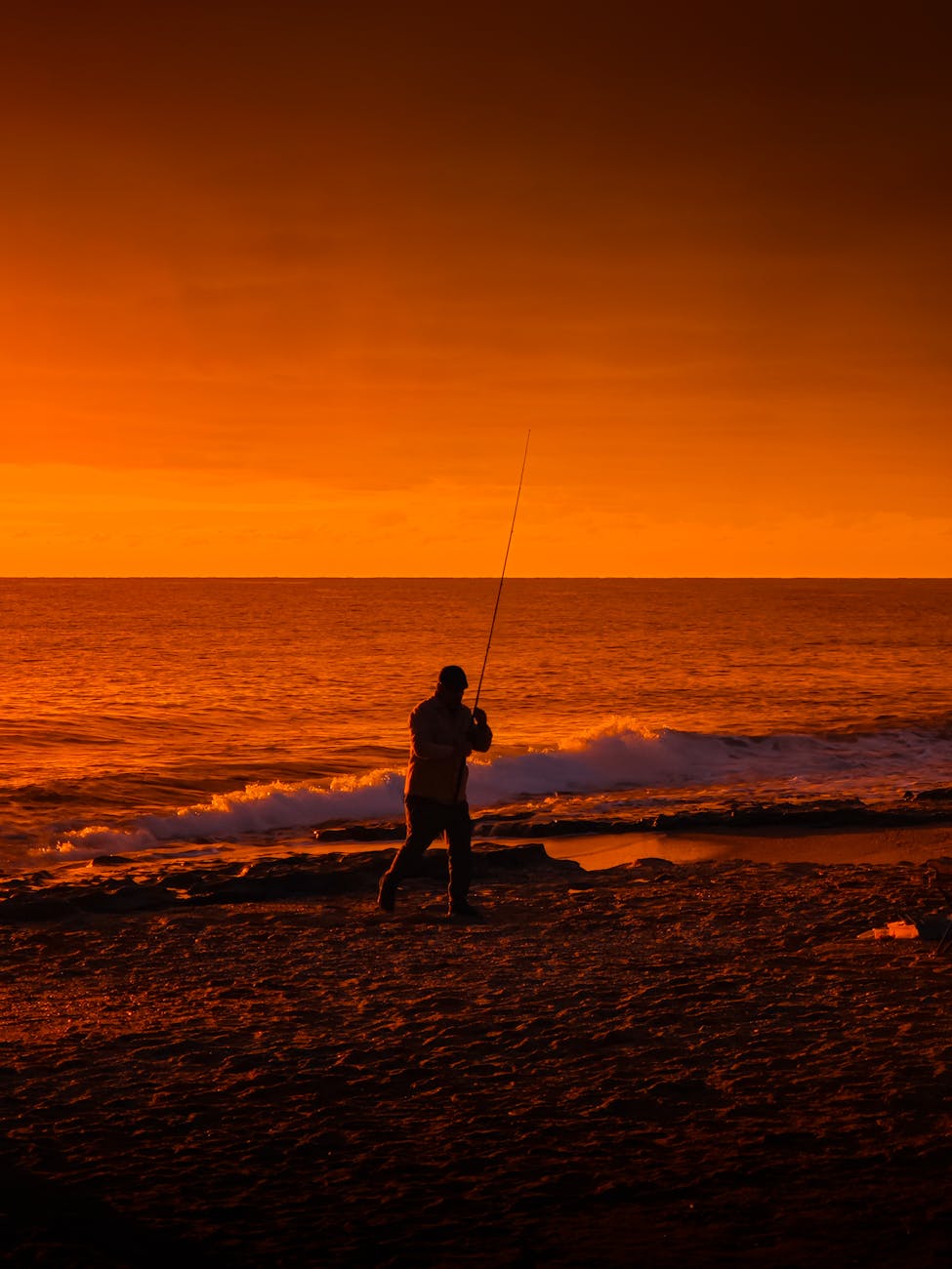 sunset fishing by the shore in antalya