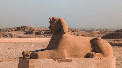 ancient sphinx in luxor egypt s sunlit desert