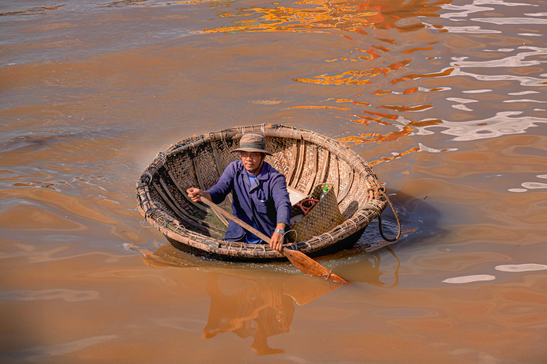 traditional vietnamese basket boat on river