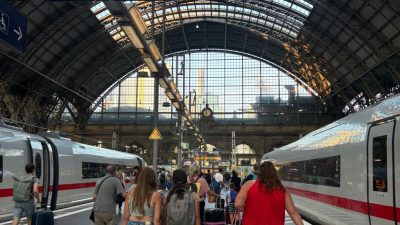 travelers at frankfurt central station