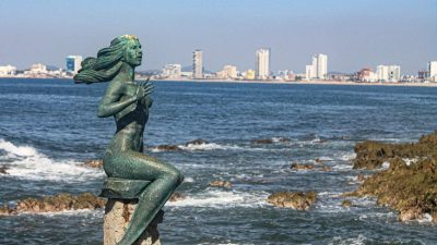 mermaid statue overlooking mazatlan coastline