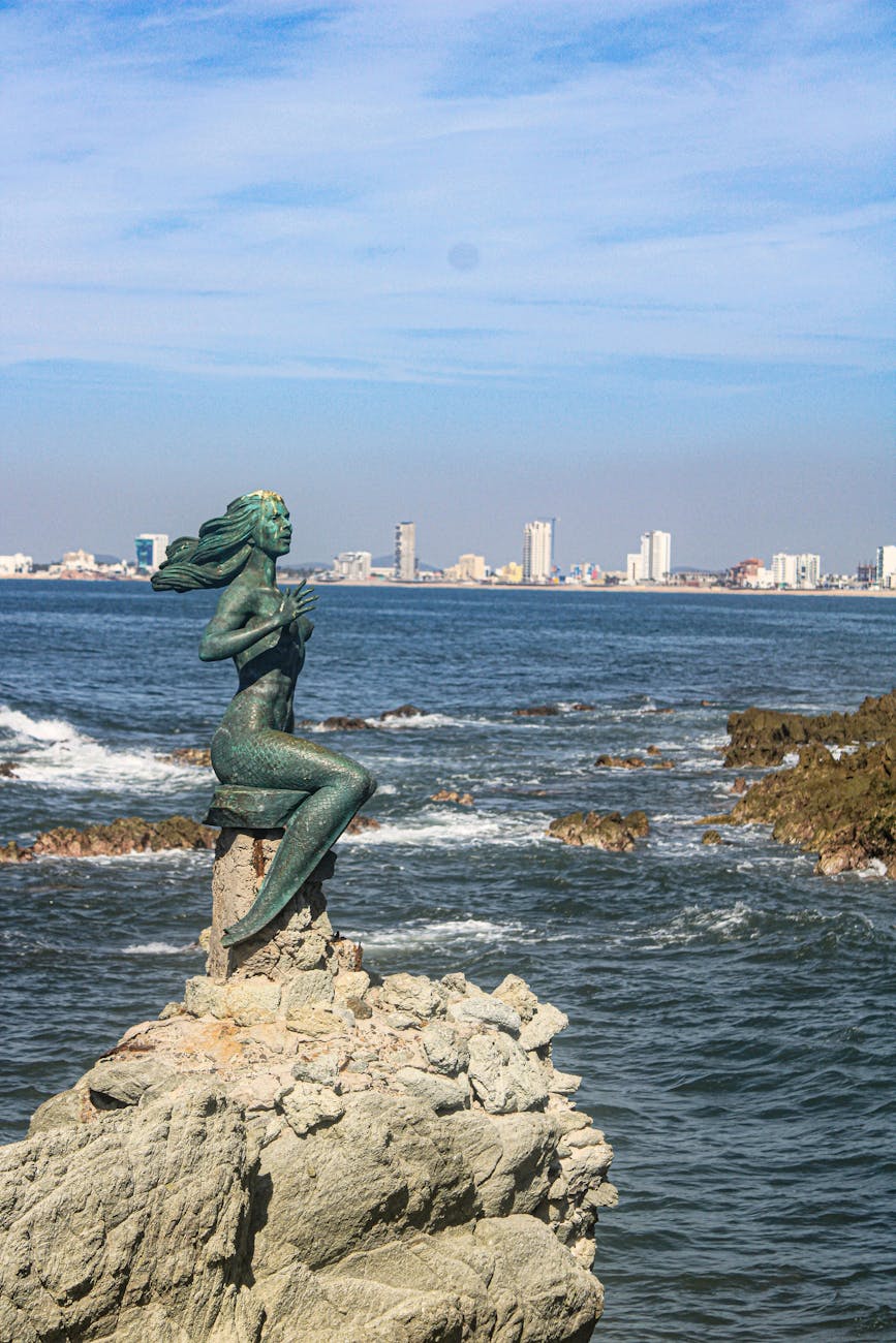 mermaid statue overlooking mazatlan coastline