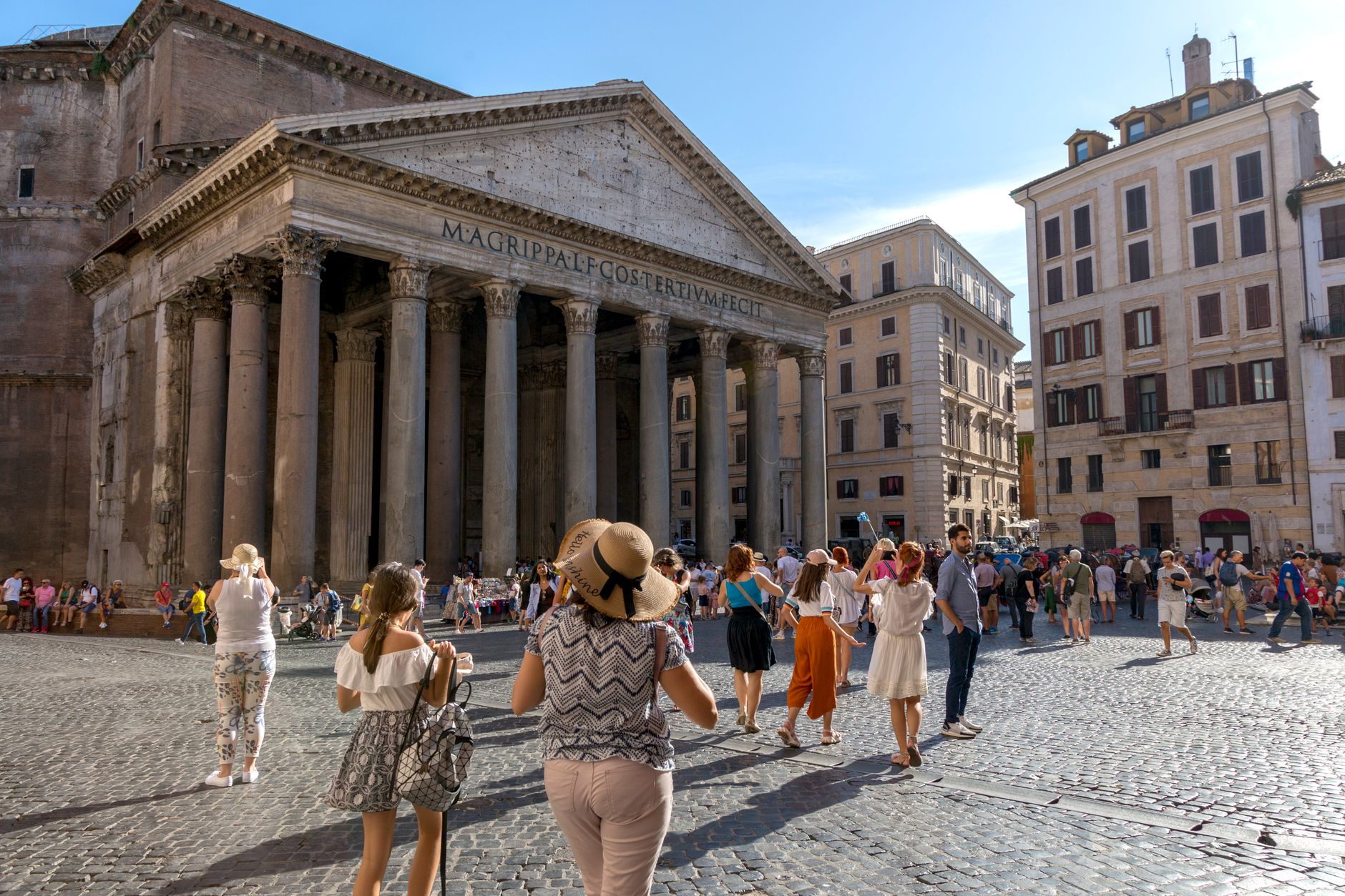 tourists exploring the historic pantheon in rome