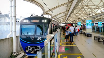 modern jakarta mrt station with commuter train