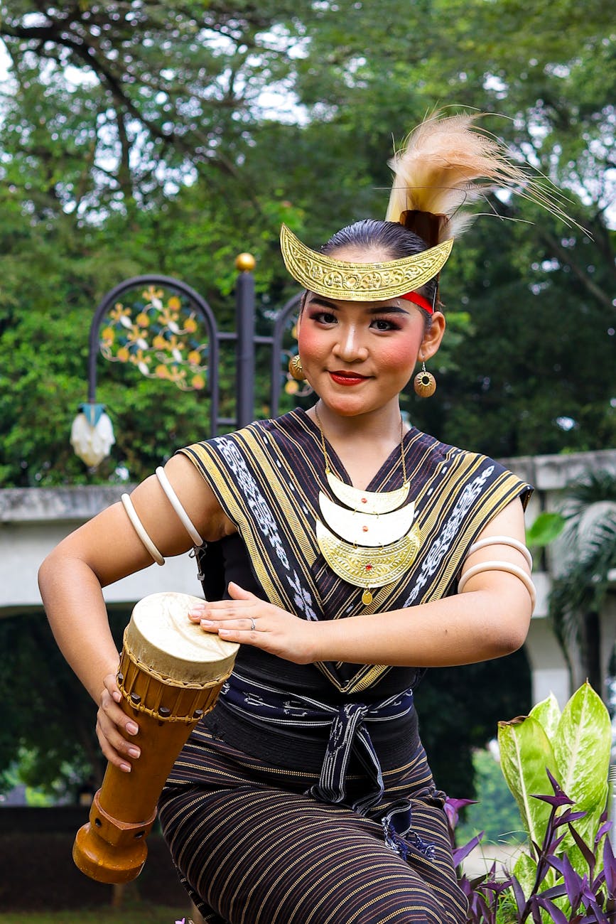 indonesian woman in traditional costume performing
