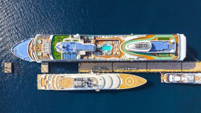 aerial view of luxury cruise ships docked at port