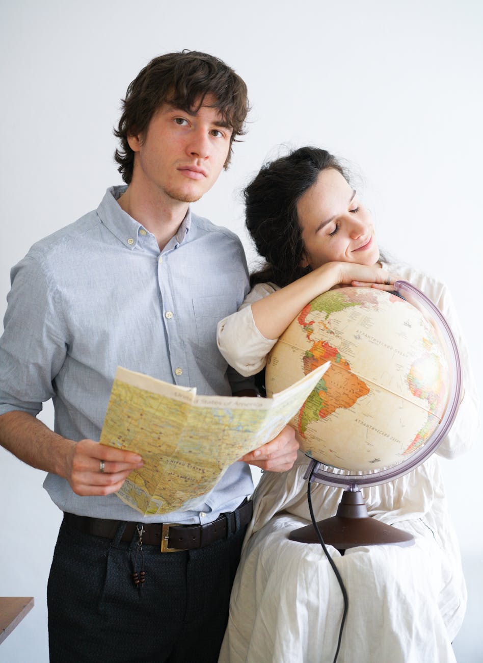 a couple planning a trip around the globe