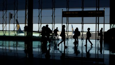 silhouette of people at the airport