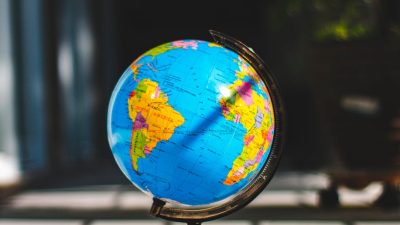desk globe on concrete surface