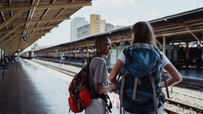 women standing at the platform